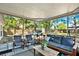 Inviting porch with comfortable seating, creating a relaxing outdoor space for entertaining or unwinding at 3615 Greatwood Ct, Land O Lakes, FL 34639