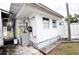 Exterior view of the shed featuring a utility sink and storage space at 38819 Otis Allen Rd, Zephyrhills, FL 33540