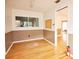 Living room featuring wood floor, and a view to other rooms at 38819 Otis Allen Rd, Zephyrhills, FL 33540