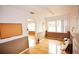Living room featuring wood floor, and a view to other rooms at 38819 Otis Allen Rd, Zephyrhills, FL 33540