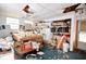 Versatile room with damaged ceiling, suitable for workshop or studio; in need of repairs at 38819 Otis Allen Rd, Zephyrhills, FL 33540