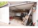 Spacious storage shed interior with overhead beams and ample room for equipment and projects at 38819 Otis Allen Rd, Zephyrhills, FL 33540