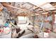 Shed interior needing repair, featuring a storage area for tools at 38819 Otis Allen Rd, Zephyrhills, FL 33540