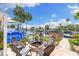 Back yard with patio and fire pit with chairs and views of the water at 4492 Kingston Dr, Hernando Beach, FL 34607