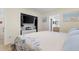 Comfortable bedroom with closet, a TV, and ensuite bathroom, perfect for relaxation and convenience at 4492 Kingston Dr, Hernando Beach, FL 34607