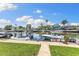 Dock with seating and boat access; a perfect waterfront lifestyle at 4492 Kingston Dr, Hernando Beach, FL 34607
