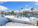Boat docked in the canal; a perfect waterfront lifestyle at 4492 Kingston Dr, Hernando Beach, FL 34607