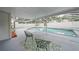Screened-in pool area with patio, outdoor seating, and ample space for entertaining at 4509 Grainary Ave, Tampa, FL 33624