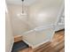 Upstairs staircase with contrasting treads and risers, leading to a bedroom and hallway at 4509 Grainary Ave, Tampa, FL 33624