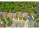 Aerial view of community featuring a backyard with screened-in pool and brick pavers at 4531 River Overlook Dr, Valrico, FL 33596