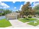 Inviting single-Gathering home with a well-kept lawn, driveway and mature landscaping at 4531 River Overlook Dr, Valrico, FL 33596