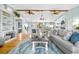 Inviting living room featuring hardwood floors, comfortable seating, and stylish decor, creating a cozy space at 4916 Palmetto Point Dr, Palmetto, FL 34221