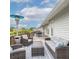 Inviting outdoor deck with patio heater, lounge seating, dining table, and scenic views, perfect for entertaining at 4916 Palmetto Point Dr, Palmetto, FL 34221