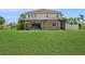 Enjoy a large backyard, complemented by a screened-in patio for relaxing and entertaining at 4973 Antiquity Way, Sarasota, FL 34240
