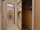 Walk-in closet with ample storage, shelving units, and hanging rods for organization and convenience at 5004 Grainary Ave, Tampa, FL 33624