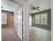 View of two bedrooms with a ceiling fan and natural light at 5125 Palm Springs Blvd # 3108, Tampa, FL 33647