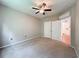 Bedroom with dual closets, carpeted floors, and ceiling fan at 5125 Palm Springs Blvd # 3108, Tampa, FL 33647
