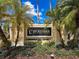 Elegant community sign for Oxford Place at Tampa Palms, showcasing lush landscaping and a welcoming atmosphere at 5125 Palm Springs Blvd # 3108, Tampa, FL 33647