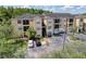 Aerial view of the condo building with well-maintained grounds and ample parking at 5125 Palm Springs Blvd # 3108, Tampa, FL 33647