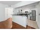 Modern kitchen with stainless steel appliances, granite countertops, and ample cabinet space at 5125 Palm Springs Blvd # 3108, Tampa, FL 33647