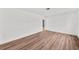Clean, freshly painted bedroom with wood flooring and a modern, minimalist design at 549 39Th Ne Ave, St Petersburg, FL 33703