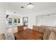 Dining room with hardwood floors, view to backyard, pool and kitchen at 549 39Th Ne Ave, St Petersburg, FL 33703