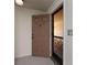 Condo front door with secure screen door and painted trim at 6190 80Th N St # 310, St Petersburg, FL 33709