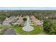 Wide aerial shot of a Gathering-friendly neighborhood featuring well-kept homes, mature trees, and a central cul-de-sac at 7509 E 26Th Ave, Tampa, FL 33619