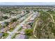 Wide aerial view of property in a residential neighborhood, located close to a natural preserve at 8441 Danbury Ln, Hudson, FL 34667