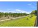 A tranquil backyard with well-maintained landscaping and serene nature preserve views at 8441 Danbury Ln, Hudson, FL 34667