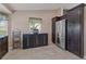 Kitchen nook with modern cabinets, stainless steel refrigerator, and breakfast bar for casual dining at 8441 Danbury Ln, Hudson, FL 34667