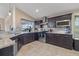 Well-appointed kitchen with granite countertops, stainless steel appliances, and ample cabinet space at 8441 Danbury Ln, Hudson, FL 34667