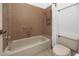Bathroom includes a tiled shower-tub, toilet, and standard vanity at 944 San Carlos Ne Ct, St Petersburg, FL 33702