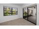 Comfortable bedroom with ample natural light and access to a screened-in patio at 944 San Carlos Ne Ct, St Petersburg, FL 33702
