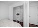 Bedroom closet featuring wood floors and built-in storage racks at 944 San Carlos Ne Ct, St Petersburg, FL 33702