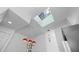 Bright kitchen with a skylight, stylish pendant lights, and modern appliances at 944 San Carlos Ne Ct, St Petersburg, FL 33702