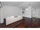 Bright living room features hardwood floors and a modern, neutral color palette at 944 San Carlos Ne Ct, St Petersburg, FL 33702