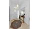 Bright foyer with tile flooring, decorative rug, and ample natural light, offering a warm welcome at 1051 Glynwood Pl, Dunedin, FL 34698