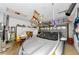 Organized two-car garage with storage cabinets, hanging storage, and a well-maintained vehicle at 1051 Glynwood Pl, Dunedin, FL 34698