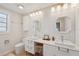 Bathroom featuring double sinks, modern fixtures, and ample counter space at 106 W Minnehaha St, Tampa, FL 33604