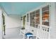 Inviting front porch with rocking chairs, offering a relaxing outdoor space at 106 W Minnehaha St, Tampa, FL 33604