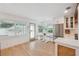 A kitchen with stainless steel appliances, a breakfast nook, and an exterior door at 106 W Minnehaha St, Tampa, FL 33604