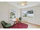 Bright room has a wooden table, chairs, and large windows to the outside at 106 W Minnehaha St, Tampa, FL 33604