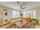 Cozy living room with comfortable seating, a stylish rug, and ample natural light at 106 W Minnehaha St, Tampa, FL 33604