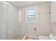 Bathroom featuring stand up shower with updated fixtures at 106 W Minnehaha St, Tampa, FL 33604