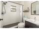 Updated bathroom features a walk-in shower, modern fixtures, and stylish decor at 10804 Bounty St, New Port Richey, FL 34654