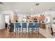 Kitchen with seating area, and well-lit cabinets and appliances perfect for modern living and entertaining at 10905 Wildcat Dr, Riverview, FL 33579