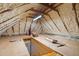 Spacious attic with professionally installed spray foam insulation and access to the home's interior at 111 29Th W St, Bradenton, FL 34205