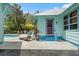 Inviting backyard features a pool, outdoor seating, and lush landscaping for ultimate relaxation at 111 29Th W St, Bradenton, FL 34205