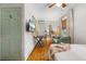Cozy bedroom space with couch, desk, and bed; enhanced by natural light and a convenient layout for relaxing at 111 29Th W St, Bradenton, FL 34205
